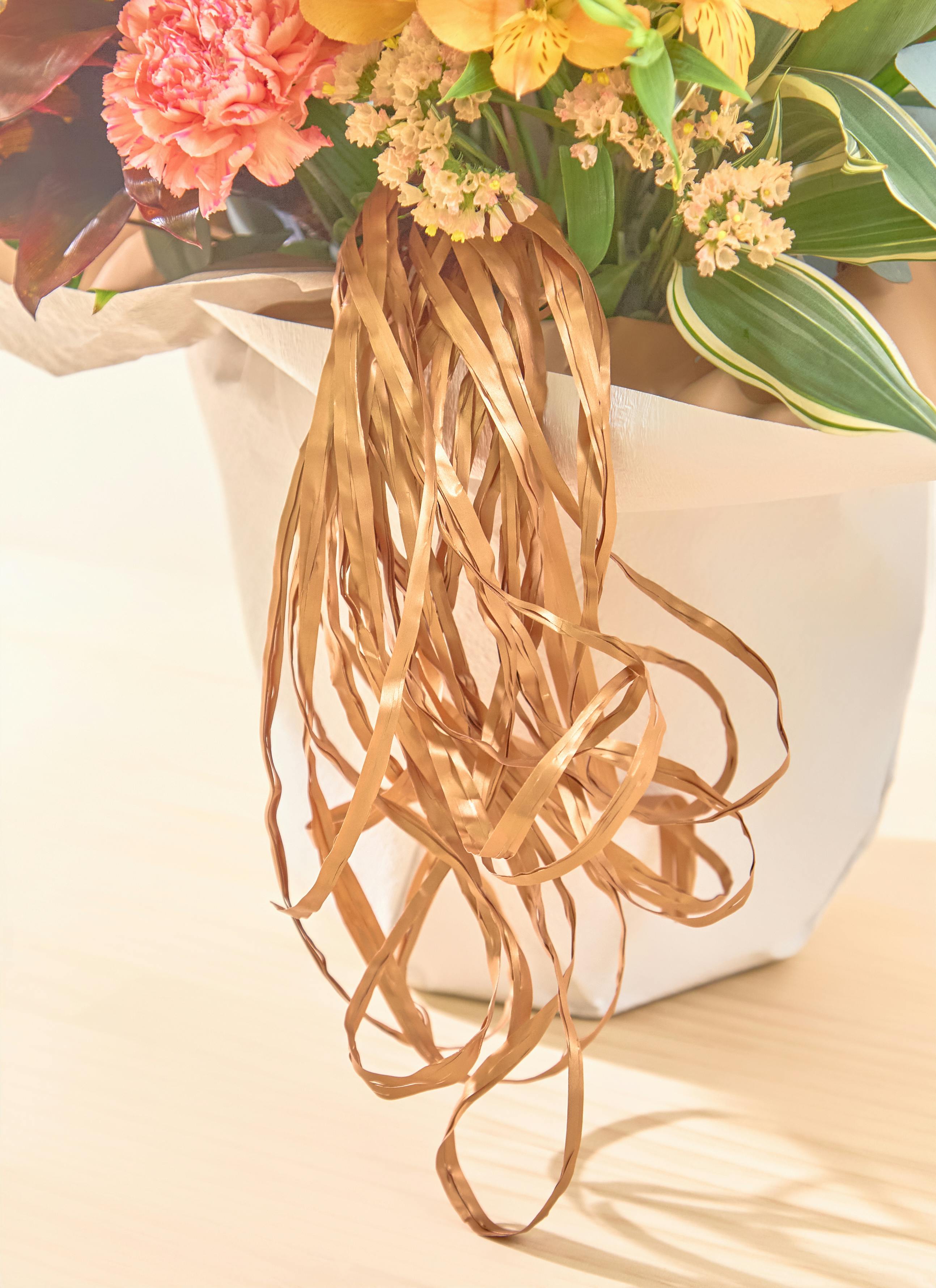 お祝い花 季節の豪華アレンジメント フローリストにおまかせ